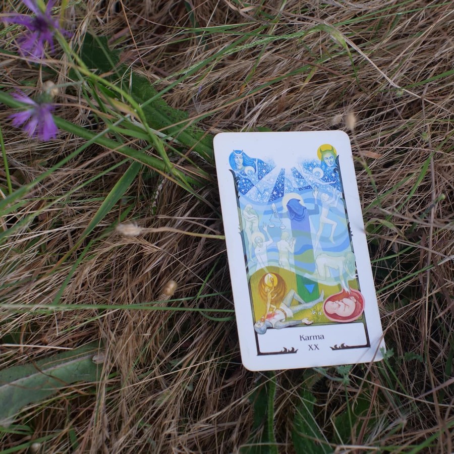 The Judgement tarot card photographed outdoors